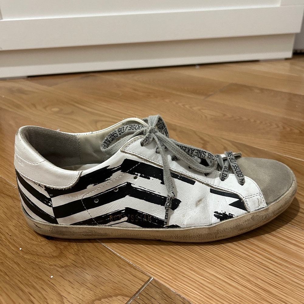 Golden Goose Deluxe Brand Black and White Sneakers